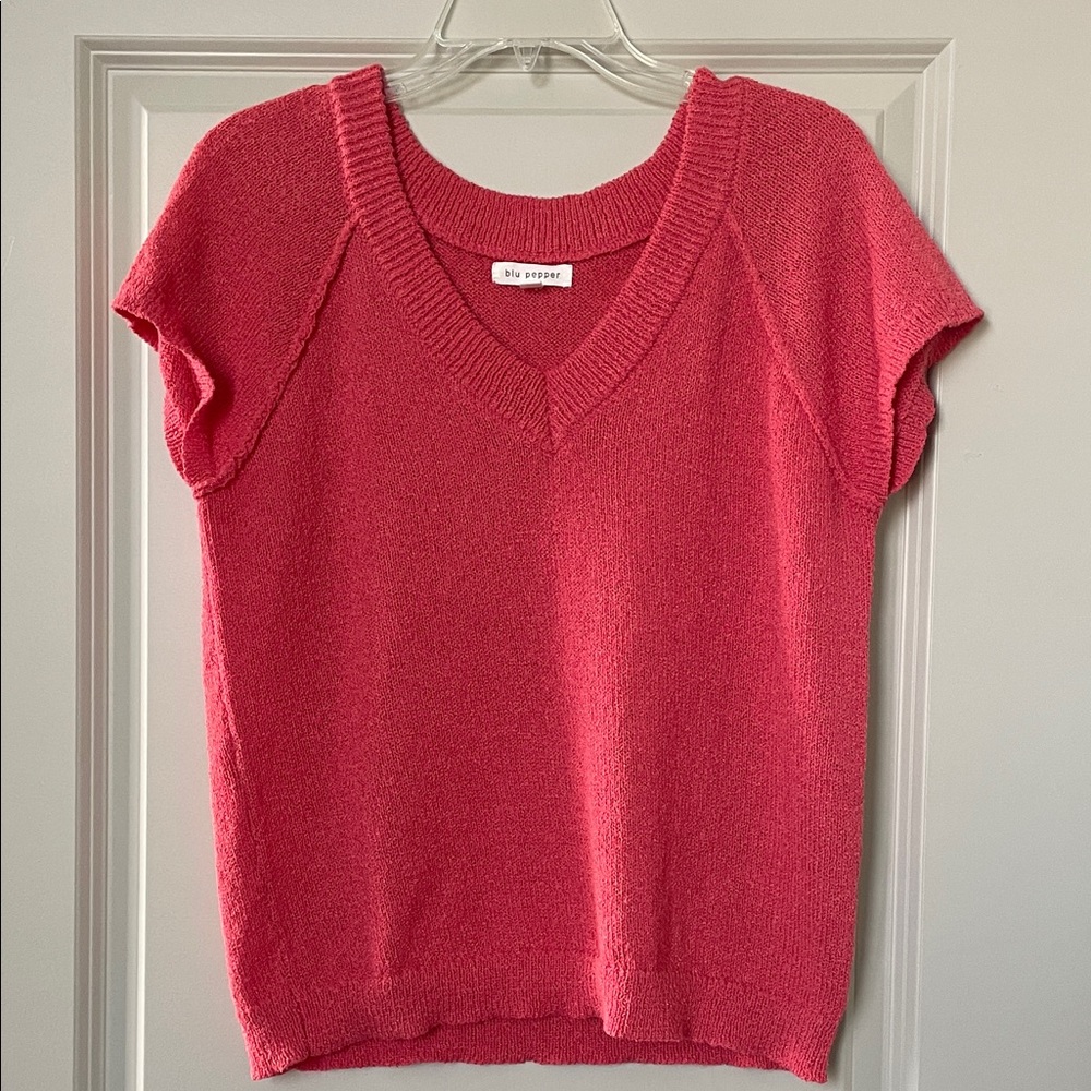 Coral Exposed Seam Sweater Top